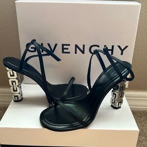 Givenchy black and silver block heels.